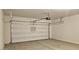 Spacious two-car garage with a new insulated garage door and automatic opener at 1246 E Thomas Dr, Casa Grande, AZ 85122