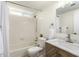 Bright bathroom with marble countertops and a shower and tub combo at 12529 N 83Rd Ln, Peoria, AZ 85381
