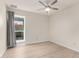 Inviting bedroom with vinyl flooring and a window with a lovely view at 12529 N 83Rd Ln, Peoria, AZ 85381