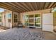 Covered patio features a refrigerator and sliding glass doors to the yard at 12529 N 83Rd Ln, Peoria, AZ 85381