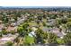 Enjoy this community from an aerial view showing lush landscaping, pools and beautiful established neighborhood at 1298 E Buffalo St, Chandler, AZ 85225
