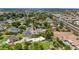Aerial view of a lush neighborhood with pools, mature landscaping, and established homes at 1298 E Buffalo St, Chandler, AZ 85225