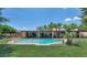 Expansive back exterior featuring a sparkling pool and desert landscaping at 1298 E Buffalo St, Chandler, AZ 85225