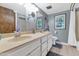 Bright bathroom with double sink vanity and neutral-toned walls, complete with framed art and ample counter space at 1298 E Buffalo St, Chandler, AZ 85225