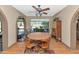 Dining room with ceiling fan and view to backyard at 1298 E Buffalo St, Chandler, AZ 85225