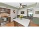Eat-in kitchen features stainless steel appliances, an island and upper cabinets at 1298 E Buffalo St, Chandler, AZ 85225