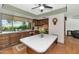 Cozy kitchen featuring wood cabinets, a center island, and large garden view at 1298 E Buffalo St, Chandler, AZ 85225