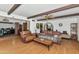 Spacious living room with brick archway, beams and wood floors at 1298 E Buffalo St, Chandler, AZ 85225
