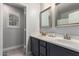 A bathroom with double vanity, and framed mirrors offering plenty of space at 13005 W Vista Paseo Dr, Litchfield Park, AZ 85340