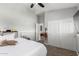Bright bedroom with carpet, ample natural light, two closets and a ceiling fan for added comfort at 13005 W Vista Paseo Dr, Litchfield Park, AZ 85340