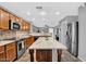 Well-equipped kitchen with stainless steel appliances, granite countertops, and ample cabinet space at 1314 S Bridgegate Dr, Gilbert, AZ 85296