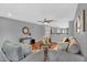 Spacious living room with hardwood floors, comfortable seating, and an open layout at 1314 S Bridgegate Dr, Gilbert, AZ 85296