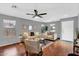 Inviting living room with wood floors, neutral decor, and ample natural light at 1314 S Bridgegate Dr, Gilbert, AZ 85296