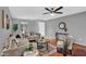 Cozy living room with wood floors, stylish decor, and plenty of seating at 1314 S Bridgegate Dr, Gilbert, AZ 85296