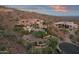 Aerial view of a sprawling estate nestled in the desert landscape, showcasing its expansive grounds at 15536 E Heavenly Vista Trl, Fountain Hills, AZ 85268