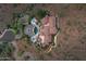 Bird's eye view showcasing the home, pool, circular motor court, and desert landscaping at 15536 E Heavenly Vista Trl, Fountain Hills, AZ 85268