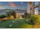 Lush backyard with stone path, manicured landscaping, and hillside views at 15536 E Heavenly Vista Trl, Fountain Hills, AZ 85268