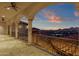 Covered outdoor living space with tiled floors, ceiling fans, and sunset views at 15536 E Heavenly Vista Trl, Fountain Hills, AZ 85268