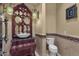 Chic powder room with unique mirror, vanity, and decorative tile accents at 15536 E Heavenly Vista Trl, Fountain Hills, AZ 85268