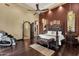 Primary bedroom featuring a king-sized bed, hardwood floors, and an en-suite bathroom at 15536 E Heavenly Vista Trl, Fountain Hills, AZ 85268