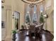 Casual dining area with tile flooring, ample natural light, and a circular table with seating for six at 15536 E Heavenly Vista Trl, Fountain Hills, AZ 85268