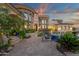 Expansive estate featuring a luxurious pool, stone architecture, and lush landscaping at 15536 E Heavenly Vista Trl, Fountain Hills, AZ 85268