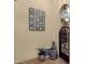 Interior hallway adorned with a patterned wall hanging, unique statue, and decorative gate at 15536 E Heavenly Vista Trl, Fountain Hills, AZ 85268