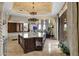 Spacious kitchen with large island, tile flooring, brick barrel ceiling, and pendant lighting at 15536 E Heavenly Vista Trl, Fountain Hills, AZ 85268