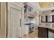 A luxury kitchen featuring custom cabinetry, stainless steel appliances, and tiled backsplash at 15536 E Heavenly Vista Trl, Fountain Hills, AZ 85268