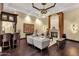 Inviting living area with fireplace, bar, hardwood floors, and elegant furnishings at 15536 E Heavenly Vista Trl, Fountain Hills, AZ 85268