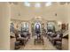 Spacious living room featuring high ceilings, decorative arches, and luxurious seating arrangements at 15536 E Heavenly Vista Trl, Fountain Hills, AZ 85268