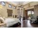 Bright main bedroom featuring a sitting area and balcony access with scenic views at 15536 E Heavenly Vista Trl, Fountain Hills, AZ 85268
