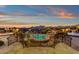 Beautiful outdoor living space with pool, iron railings, and mountain views at 15536 E Heavenly Vista Trl, Fountain Hills, AZ 85268