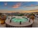 Luxury spa with water features and scenic sunset views over the valley at 15536 E Heavenly Vista Trl, Fountain Hills, AZ 85268