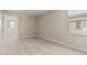 Bedroom with neutral colored carpet and walls with natural light from a window at 15593 S 180Th Ln, Goodyear, AZ 85338