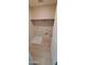 Functional laundry room with tile flooring, shelf, and hookups for appliances at 15593 S 180Th Ln, Goodyear, AZ 85338