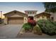 Charming single-Gathering home featuring a two-car garage, desert landscaping and beautiful curb appeal at 157 N 110Th Ave, Avondale, AZ 85323