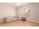Bright bedroom with light colored flooring and natural light from large windows at 16066 W Sandia Park Dr, Surprise, AZ 85374