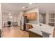 Bright kitchen with stainless steel appliances and views of adjacent living and dining areas at 16066 W Sandia Park Dr, Surprise, AZ 85374