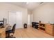 Well-lit office offering built-in shelves and additional storage options at 16066 W Sandia Park Dr, Surprise, AZ 85374