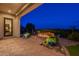 Backyard patio with a fire pit and beautiful landscape design at 1617 E Copper Holw, Queen Creek, AZ 85140