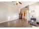 Spacious bedroom with hardwood floors and a view of the bathroom at 1617 E Copper Holw, Queen Creek, AZ 85140