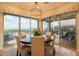 Stylish dining room with an open layout and views of the manicured backyard at 1617 E Copper Holw, Queen Creek, AZ 85140