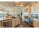 Gourmet kitchen with an open design, stainless steel appliances, and island seating at 1617 E Copper Holw, Queen Creek, AZ 85140