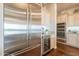 Gourmet kitchen featuring stainless steel appliances and custom cabinetry at 1617 E Copper Holw, Queen Creek, AZ 85140