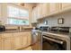 Functional laundry room with modern appliances and a practical layout at 1617 E Copper Holw, Queen Creek, AZ 85140