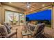 Relaxing patio with comfortable seating, fire pit and beautiful twilight views at 1617 E Copper Holw, Queen Creek, AZ 85140