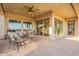 Spacious outdoor patio featuring comfortable seating, showcasing backyard views and a seamless indoor-outdoor living experience at 1617 E Copper Holw, Queen Creek, AZ 85140