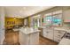 Open concept living space with view of kitchen, living room, and backyard at 1697 E Linda Ln, Gilbert, AZ 85234
