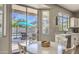 Cozy breakfast nook with a view of the backyard pool and outdoor patio area at 1697 E Linda Ln, Gilbert, AZ 85234